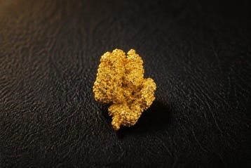 Goud Goud nugget - Hoogte: 7 mm - Breedte: 6.2 mm- 1.01 g -
