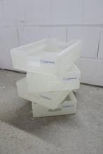 Container - Plastic - Vier lades voor de vliegtuigtrolley.