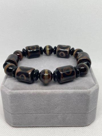 Exclusieve Tibetaanse armband met Dzi-kralen van