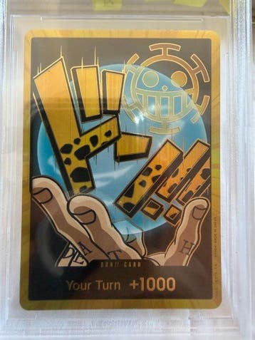 Bandai - 1 Graded card - One Piece - Don Gold Trafalgar Law, Hobby en Vrije tijd, Verzamelkaartspellen | Overige, Nieuw