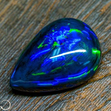 Grote eerste kwaliteit zwarte opaal cabochon 21,15 ct- 4.23
