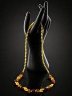 Barnsteen - Refined Amber Bead Necklace – Geometric Accents