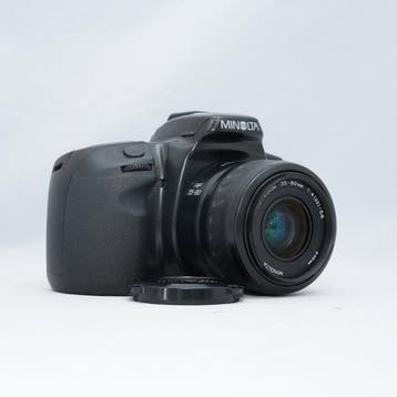 Minolta 303si + AF Power Zoom 35-80mm f/4-5.6 Single lens, Nieuw
