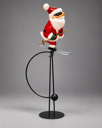 sculptuur, Metalen kerstman op ski’s – vrijstaand schommel