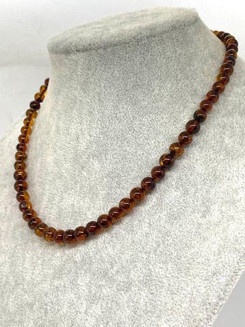 Het geheim van Baltic Wave • Ketting met ronde, Verzamelen