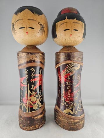 Paire de kokeshi fabriquées par Takahashi Tatsuro - Grand