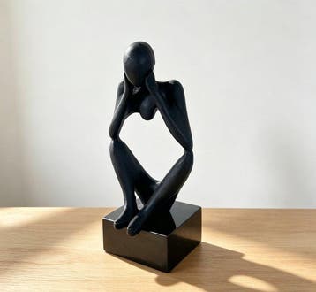 sculptuur, Abstract sculpture of a thinker holding their