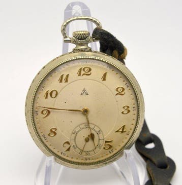 A Art Deco - mechanical pocket watch with leather chain -