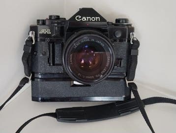 Canon A-01 + FD 50mm 1:1.8 + Power Winder A Single lens, Audio, Tv en Foto, Nieuw