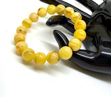 Armband Natuurlijk wit Baltisch amber met hele stenen kralen
