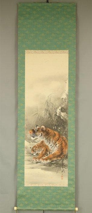 Mother Tiger and Her Cub Peering Out from Grass with