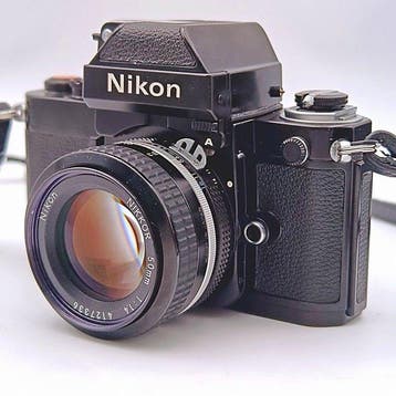 Nikon F2 Photomic A DP-11 black + Nikkor 1.8/50mm Ai + HS-9