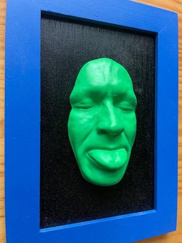 gregos - Green light mockery on black background-blue frame