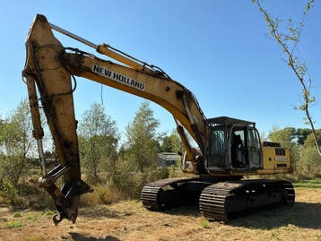 Online veiling - 2007 New Holland E485 Rupsgraafmachine, Ophalen