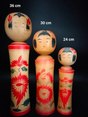 Zes traditionele Naruko kokeshi in verschillende formaten