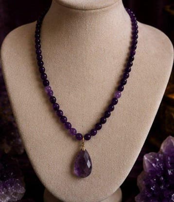Amethist kralenketting met facetgeslepen hanger -