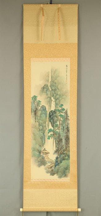 Waterfall and Mountain Landscapes Thatched Roof House with