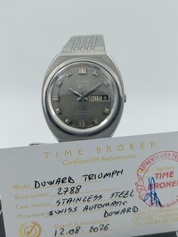 Duward - Triumph Automatic Day-Date - Zonder minimumprijs -