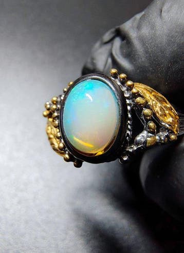 Ring met natuurlijke Ethiopische opaal – 925 zilver,