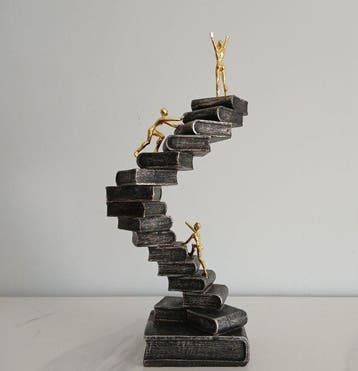 Sculpture, Escalade de livres - 31 cm - Résine