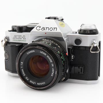 Canon AE-1 Program zilver + FD 50mm f/1.8 | Tweedehands, Audio, Tv en Foto, Verzenden, Zo goed als nieuw