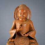 Bouddha assis sur un socle de lotus élevé - Mudra Vitarka -