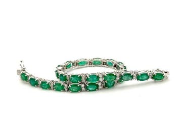 Tennis armband - 18 karaat Witgoud - 12.15ct. tw. Smaragd -