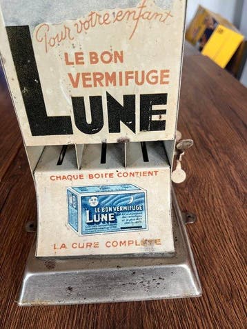 Lune - Automaat - Distributeur LUNE Le bon vermifuge -