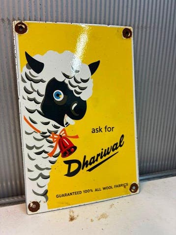 Dhariwal – 100% Wool Fabrics – Emaille Reclamebord - Emaille
