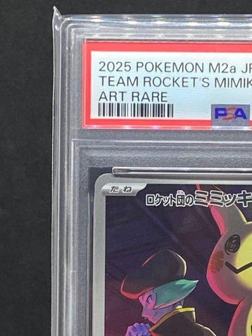 Pokémon - 1 Graded card - Team Rockets Mimikyu #205/193 AR, Nieuw