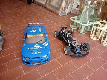 Kyosho 1:10 - Model sportwagen - KYOSHO CALSONIC SKYLINE 10, Hobby en Vrije tijd, Nieuw