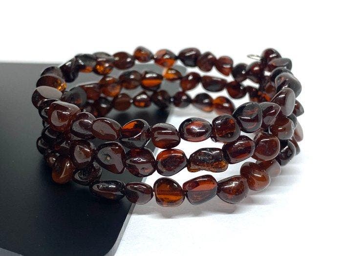 Schaduwen van Amber Dusk - Drie-laags Baltische Amberarmband, Antiek en Kunst, Curiosa en Brocante