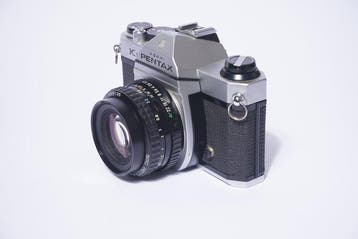 Pentax K 1000 con SMC Pentax-a 50/1,7. Single lens reflex, Audio, Tv en Foto, Nieuw