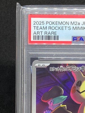 Pokémon - 1 Graded card - Team Rockets Mimikyu #205/193 AR