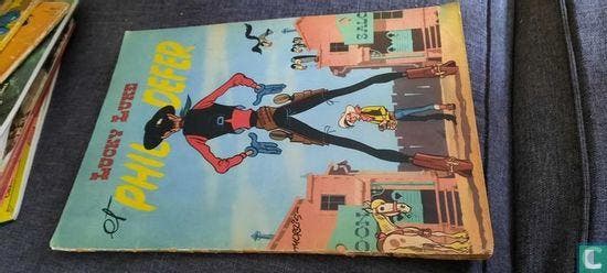 Lucky Luke - Phil Defer - 1956, Boeken, Stripverhalen, Gelezen, Eén stripboek, Verzenden