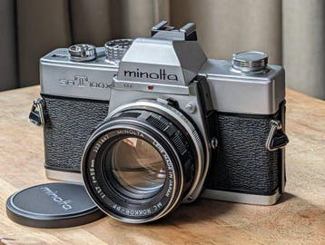 Minolta SRT 100 x + MC Rokkor PF 1,7/55mm Appareil photo, Audio, Tv en Foto, Nieuw