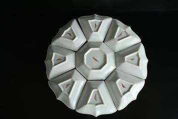 A set of exceptionally rare dipping saucers (known as
