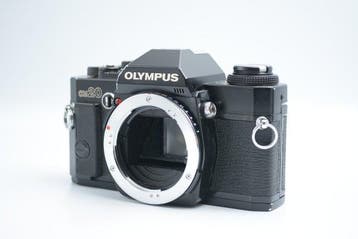 Olympus OM-20 + S Zuiko MC Auto-Zoom 4/35-70mm Single lens