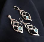 Larimar. Set van hanger en oorbellen met beveiligde