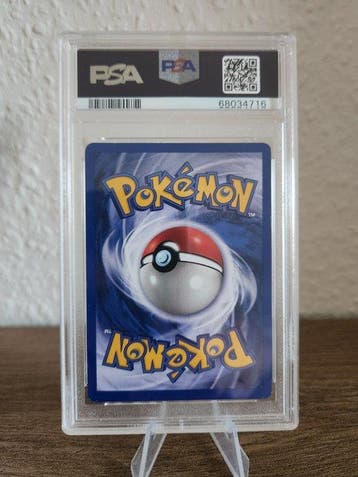 Pokémon - 1 Graded card - Charizard 4 Foil, Holo - PSA 4 -, Hobby en Vrije tijd, Nieuw