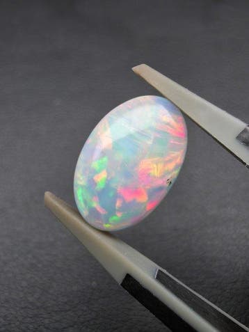 2.34cts White Opal Cabochon- 0.47 g