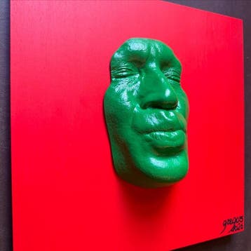 gregos - Green kiss on red background