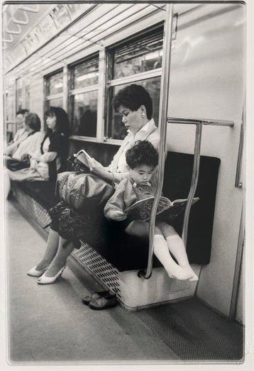 Lionel Derimais - Moment de lecture, mère et son fils,