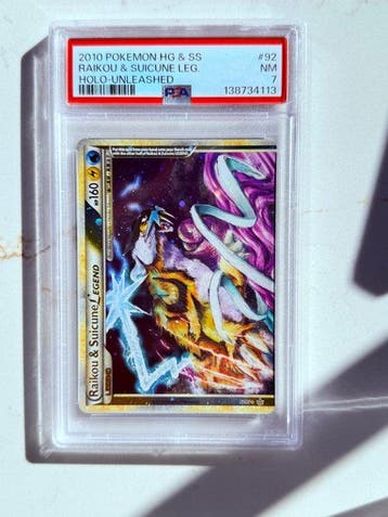 Pokémon - 1 Graded card - Raikou & Suicune #92 Foil - PSA 7, Hobby en Vrije tijd, Nieuw