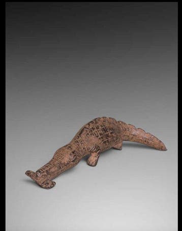 Magnifique crocodile portant sa proie Dogon - animal en