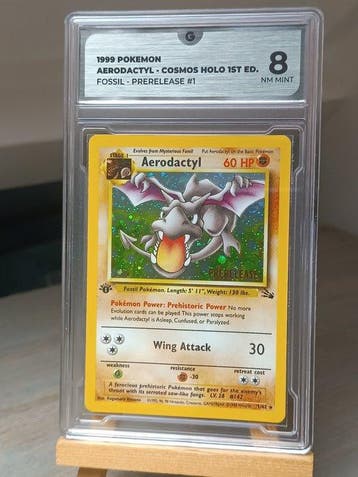 Pokémon - 1 Graded card - Aerodactyl Première édition - GG 8, Hobby & Loisirs créatifs
