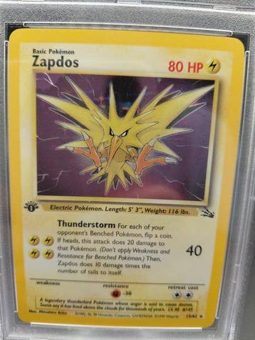 Pokémon - 1 Graded card - Zapdos 15 Première édition, Foil,