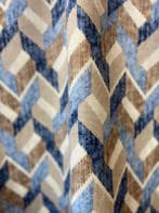 Exclusieve stof met geometrische patronen in dubbele hoogte,