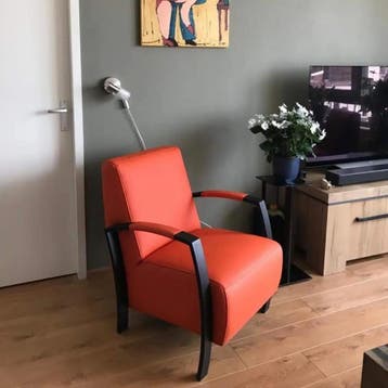 Fauteuil met stalen frame - oranje leer, Huis en Inrichting, Fauteuils, Ophalen of Verzenden, Nieuw