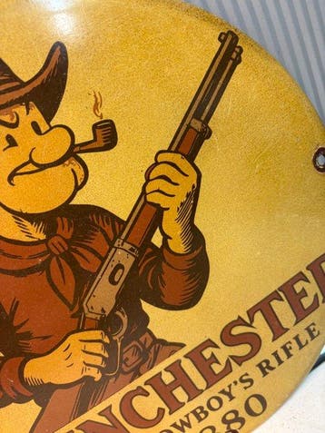 Emaille bord – Winchester “The Cowboy’s Rifle 1880” – rond –